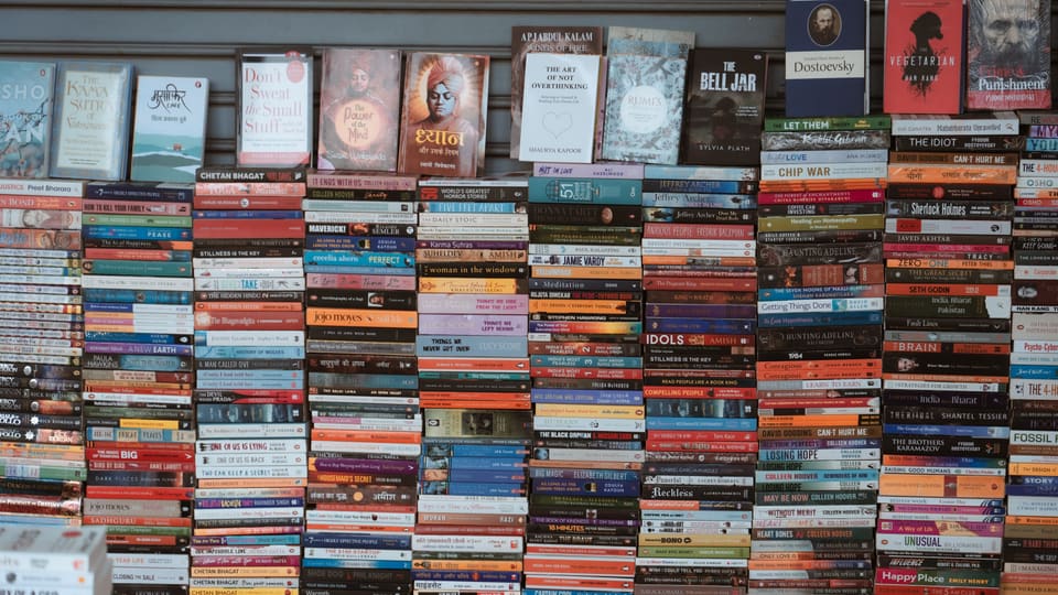 Vibrant collection of books on display in a Delhi bookstore. Perfect for book lovers and readers.